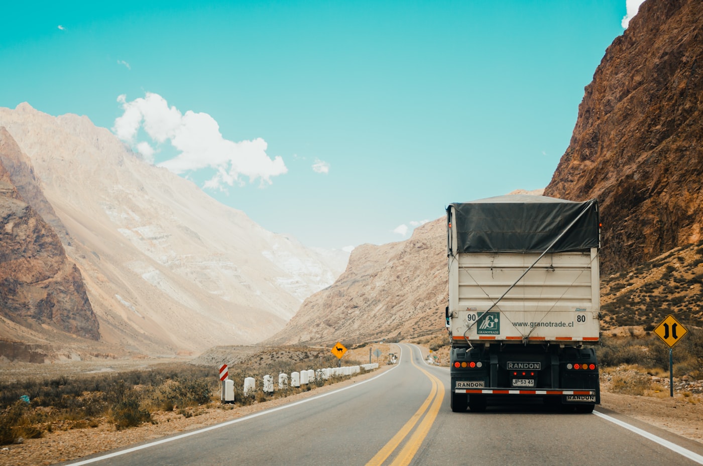 Semi truck on the highway at dusk